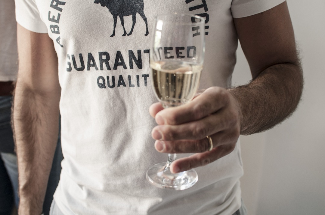 man with a champagne glass celebrating happy new year 2019