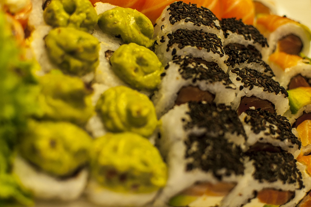 plate with wasabi and sesame sushi variety