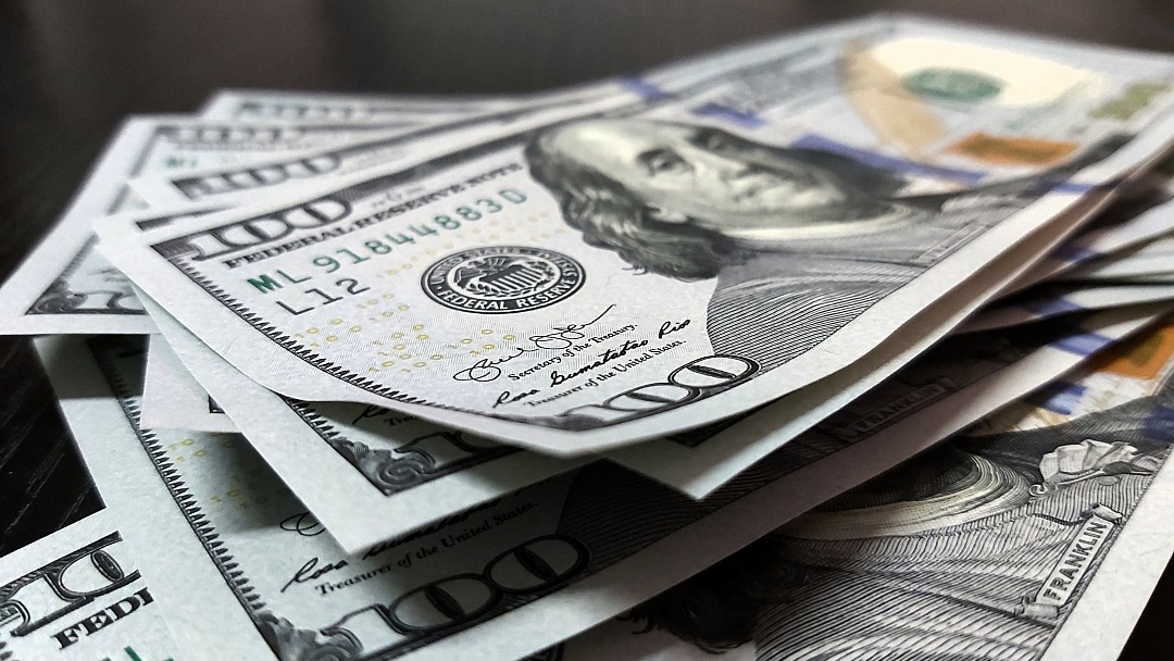 Finance and Currency One Hundred Dollar Bill Stacks