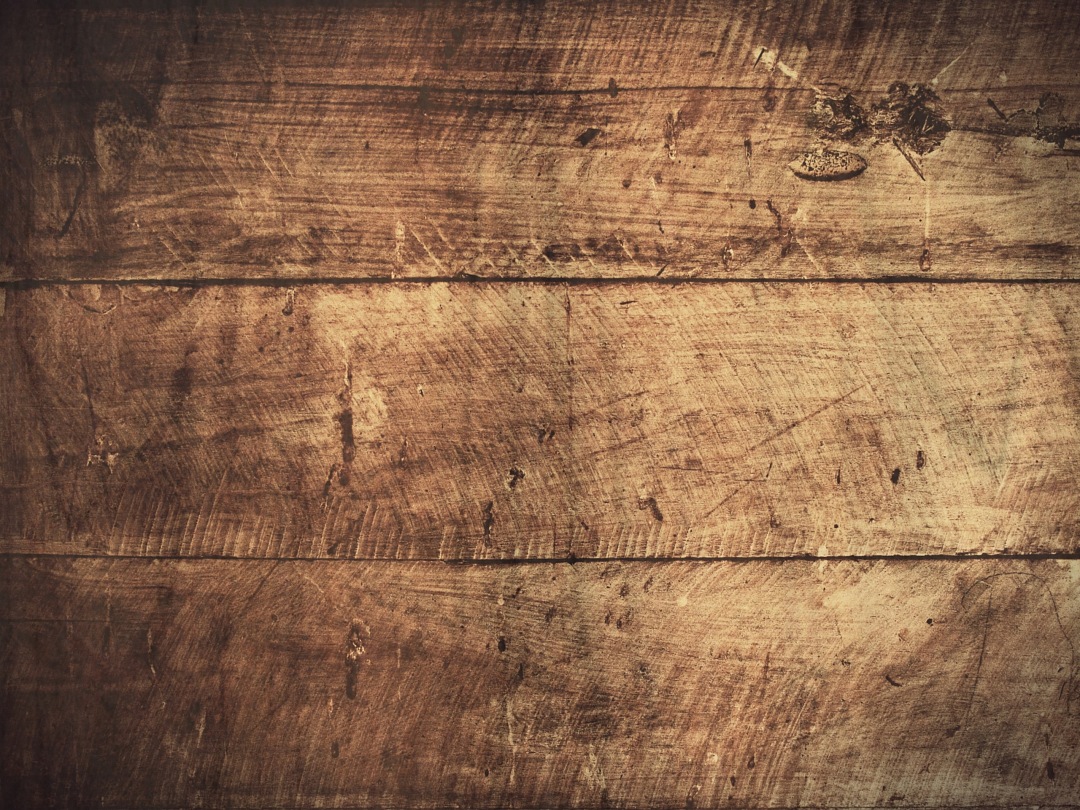 a wooden background with a dark brown wood texture