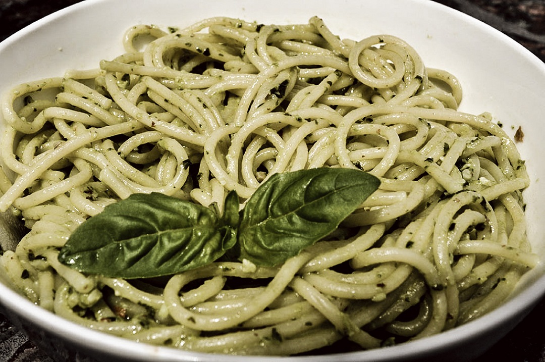 spaghetti pasta dish with basil pesto