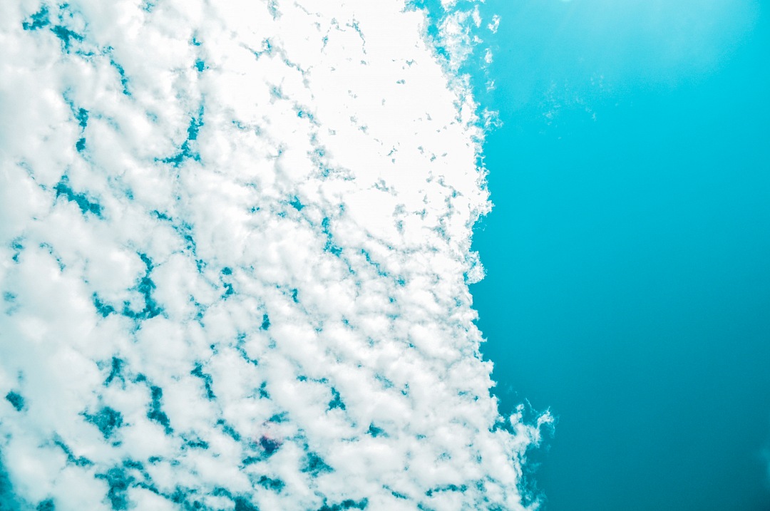 Celestial background of half of sky with clouds