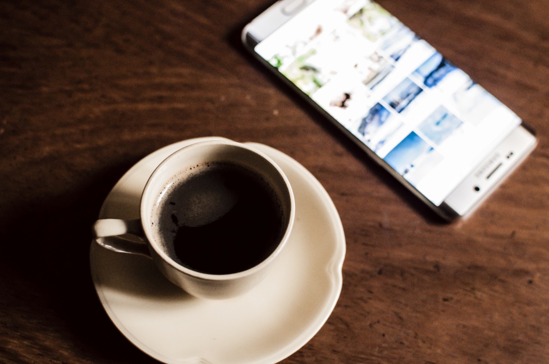 Cup of coffee with Smartphone