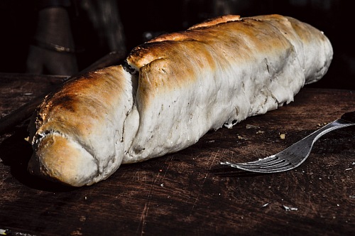 homemade baked rustic bread with a fork