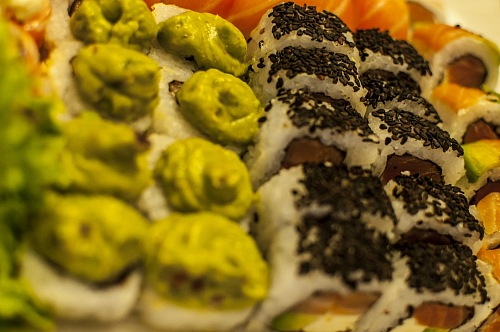 plate with wasabi and sesame sushi variety