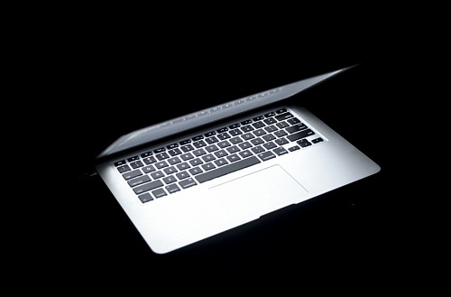 Laptop on black background