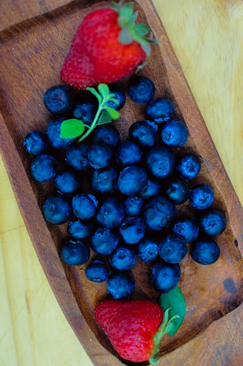 Blueberries with strawberry top view
