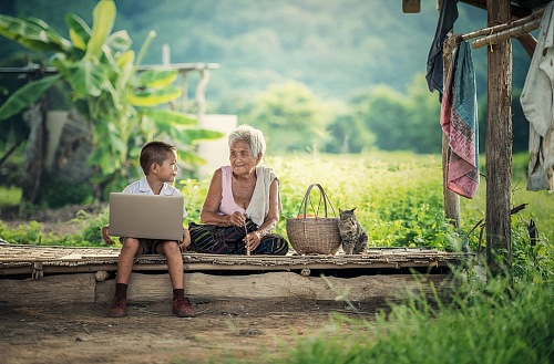 Grandmother with her grandson outdoors