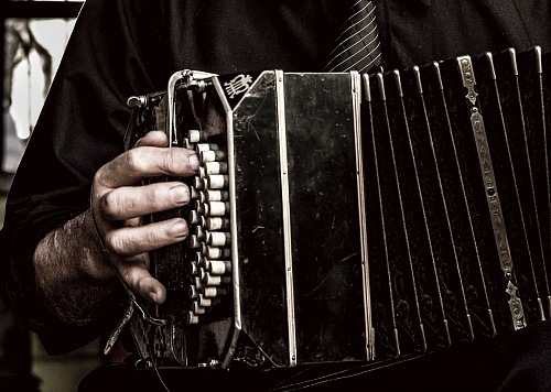 tango musician playing a bandoneon