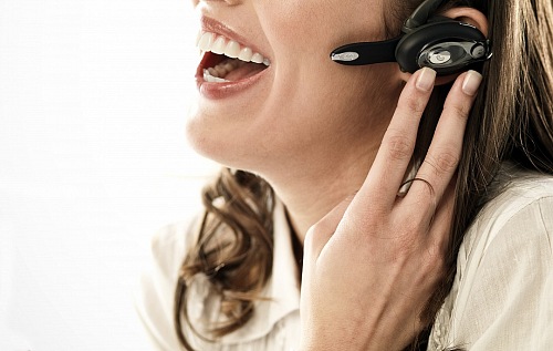 Telemarketing woman smiling