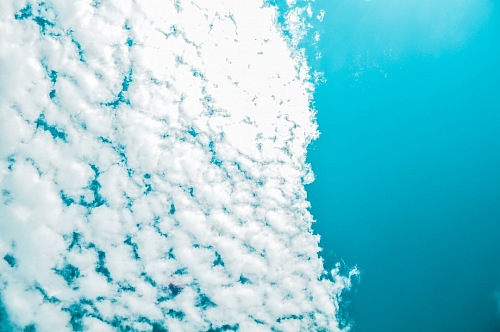 Celestial background of half of sky with clouds