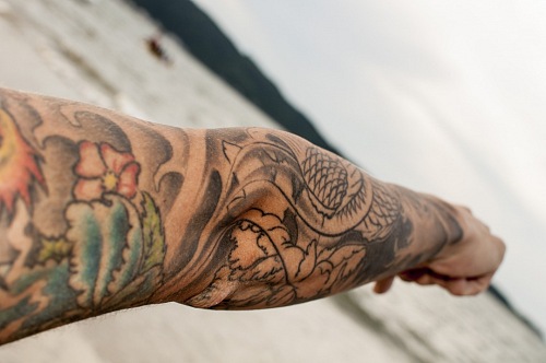 Men with oriental Tattoo bombinhas Santa Catarina, Brasil